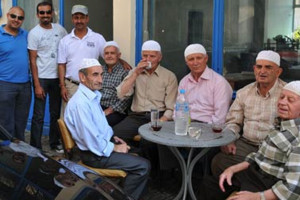 Greek muslim men having afternoon tea in Krios